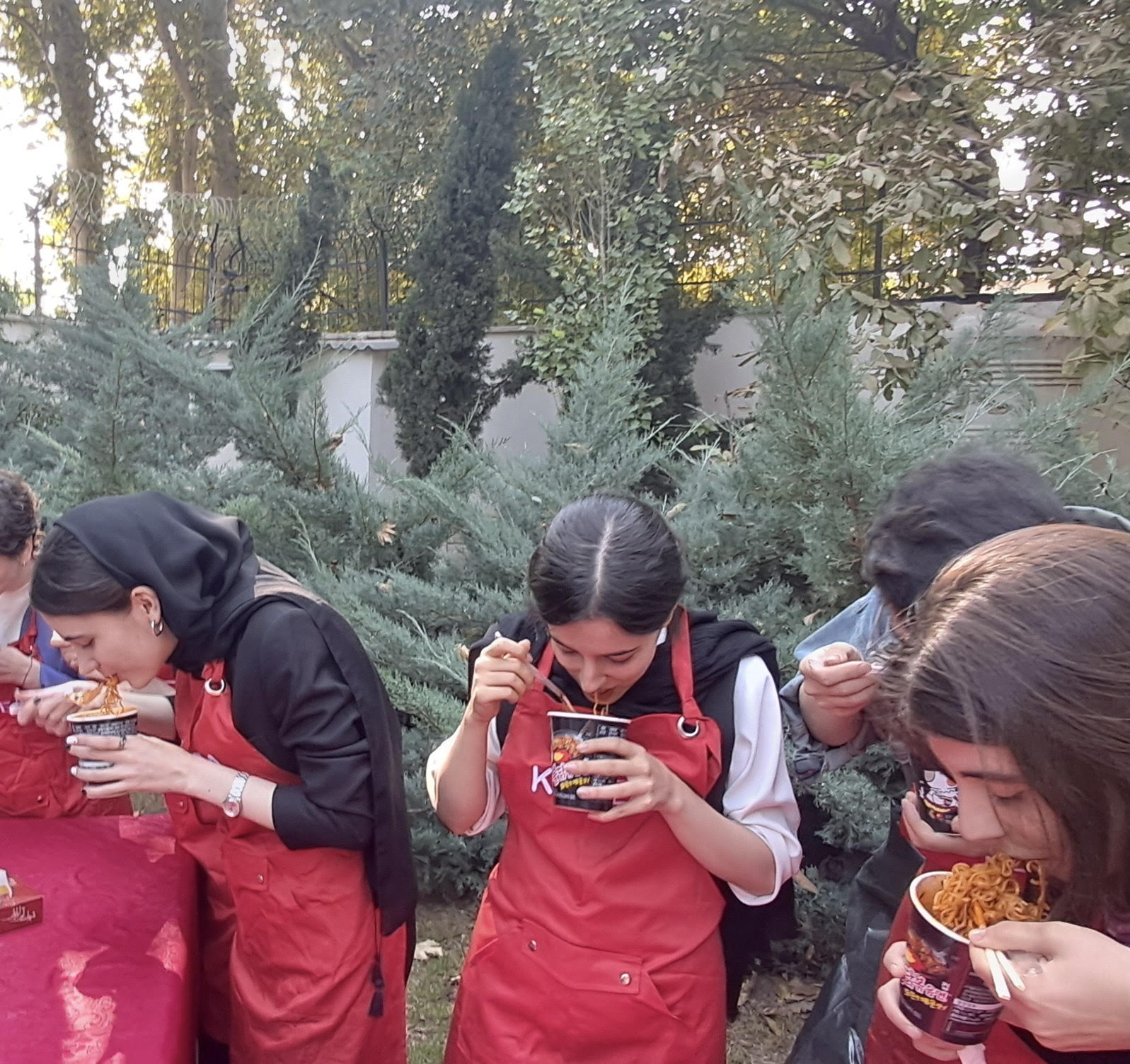 Participants trying hot noodle