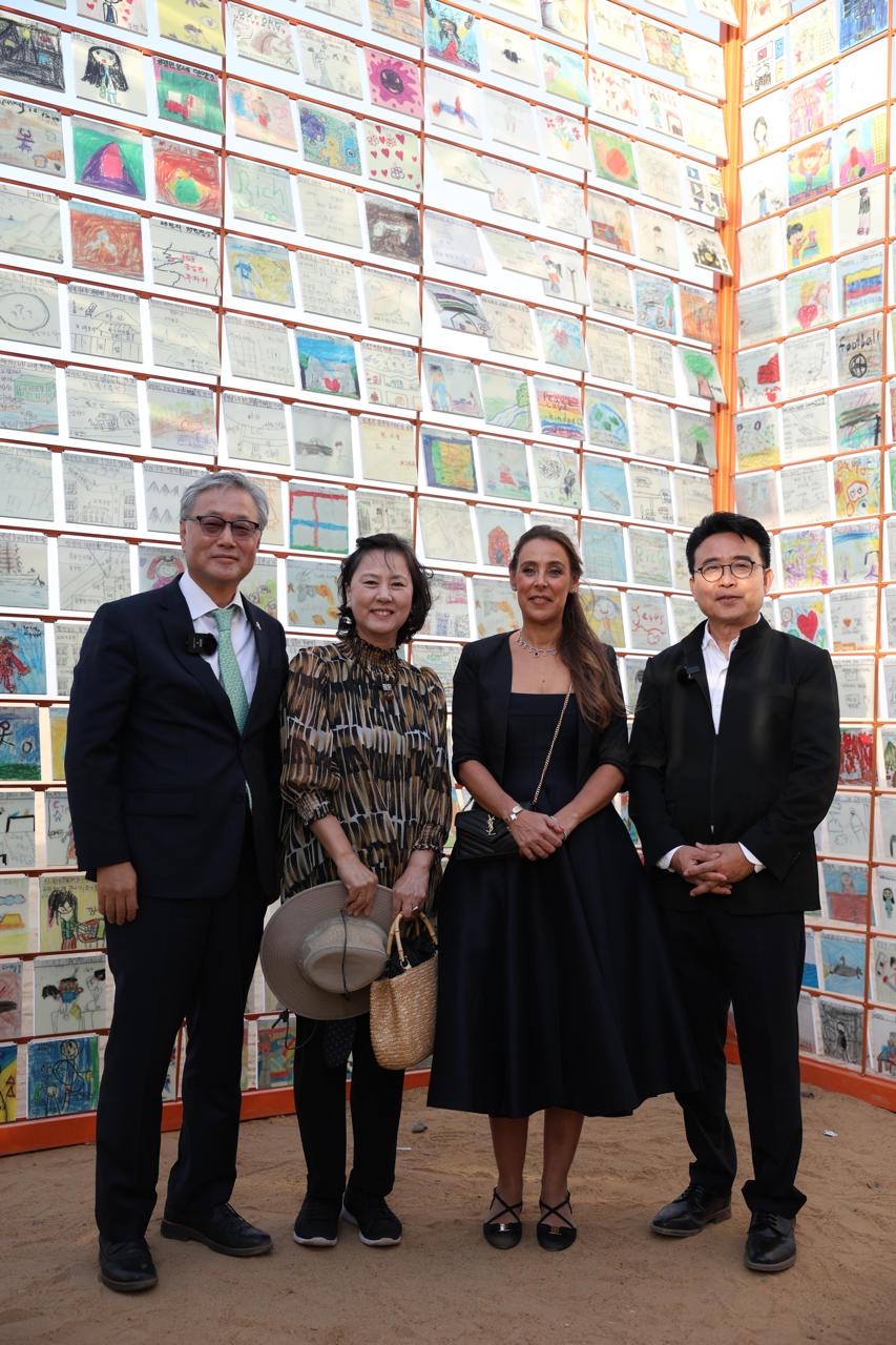 The Korean Ambassador to Cairo, Kim Yong-Hyun and his wife, accompanied by the Korean artist Ik-Joong Kang and Ms. Nadine Abdel Ghaffar, founder of the 'Forever is Now' exhibition.